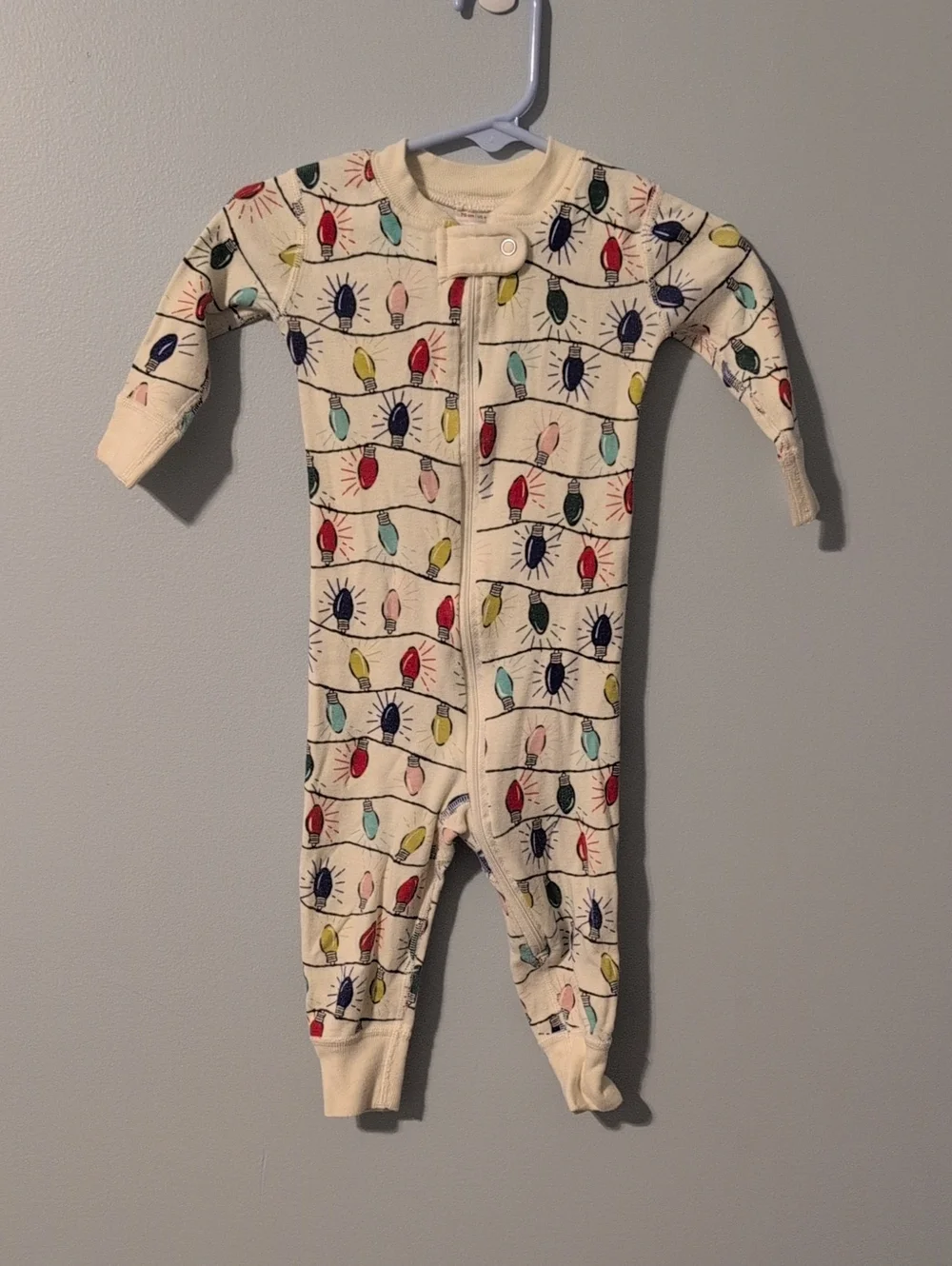 Hanna Andersson Cream Footed One-Piece with Multicolor Light Bulb Print